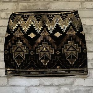 Mini skirt with beautiful sequins.  Like new size small